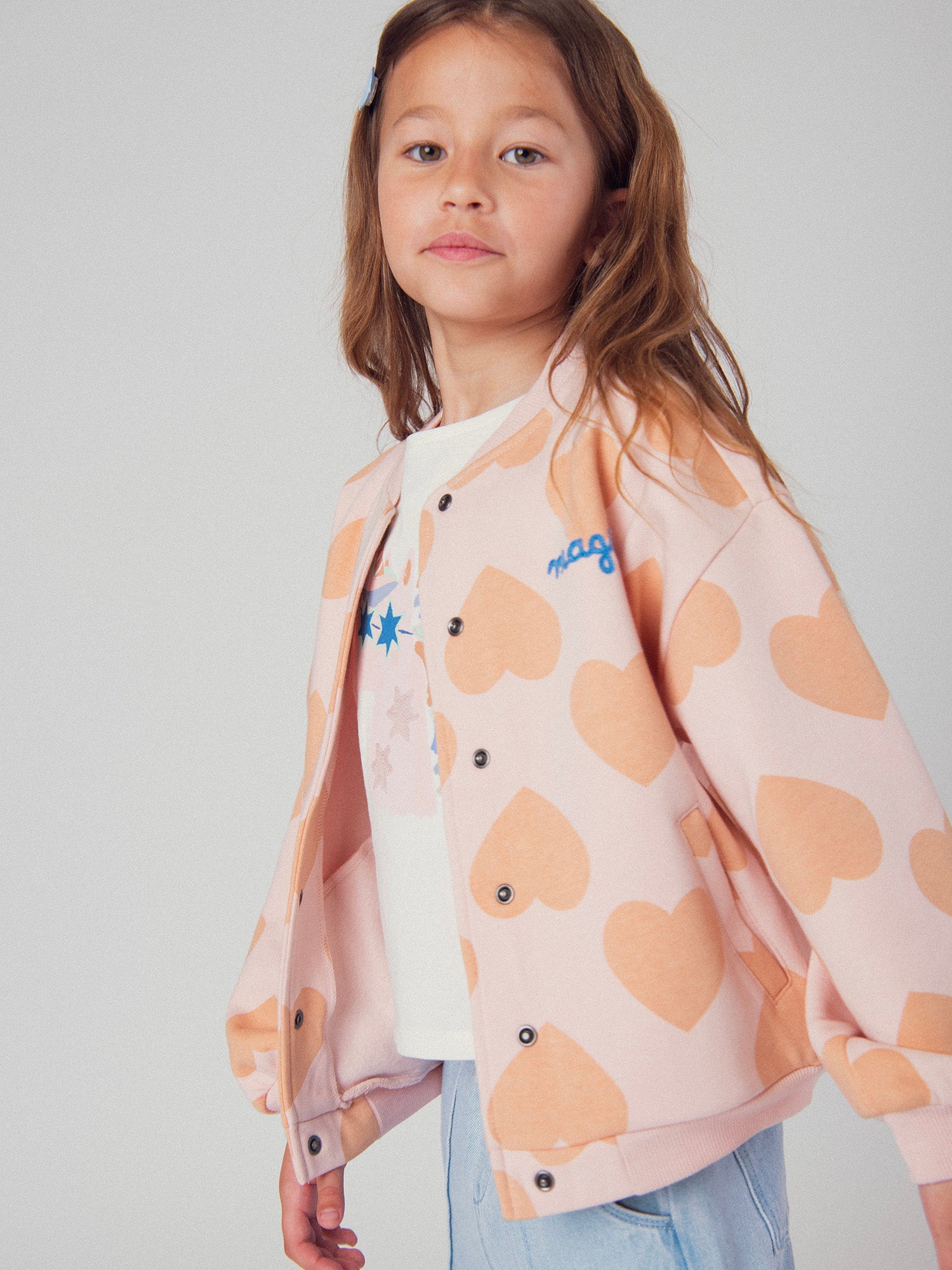 Gilet rose à imprimé coeur pour fille