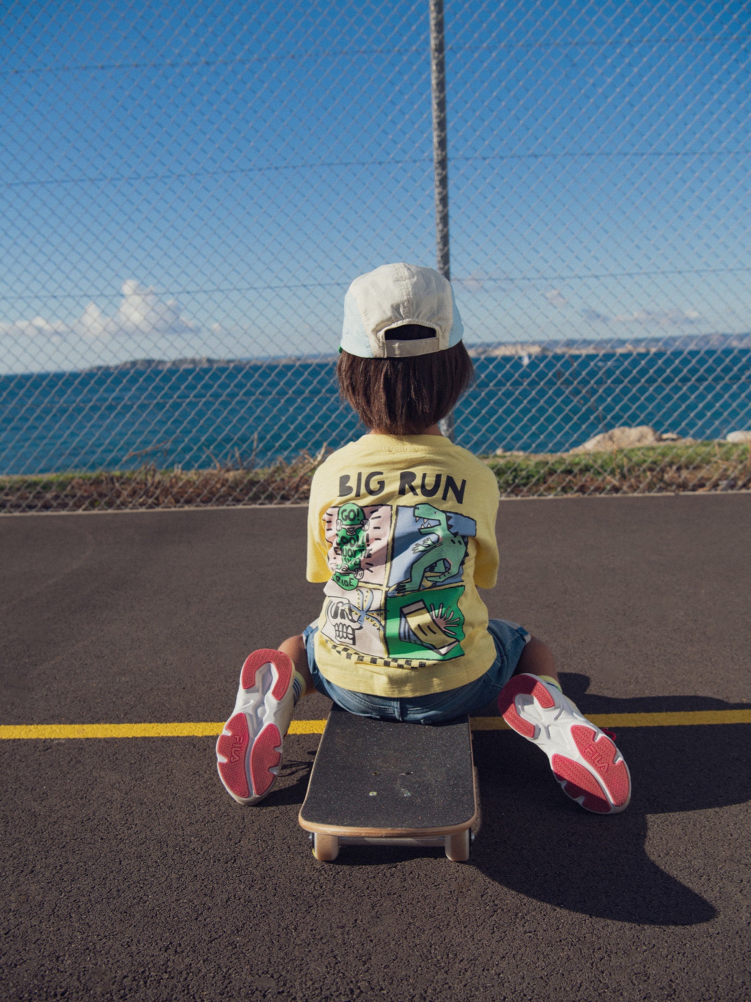 T-shirt jaune animation dinosaure pour garçon