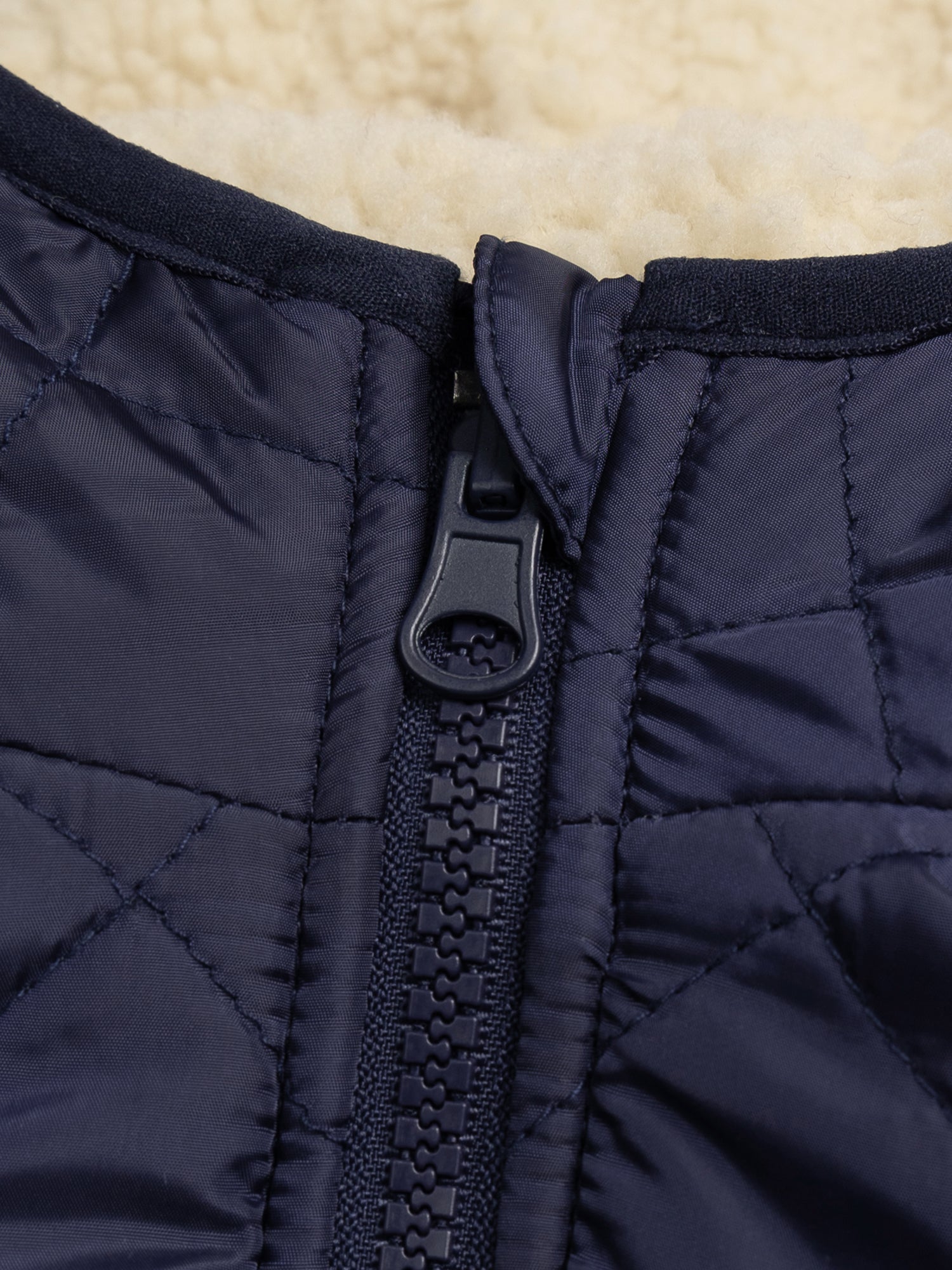 Manteau réversible effet mouton