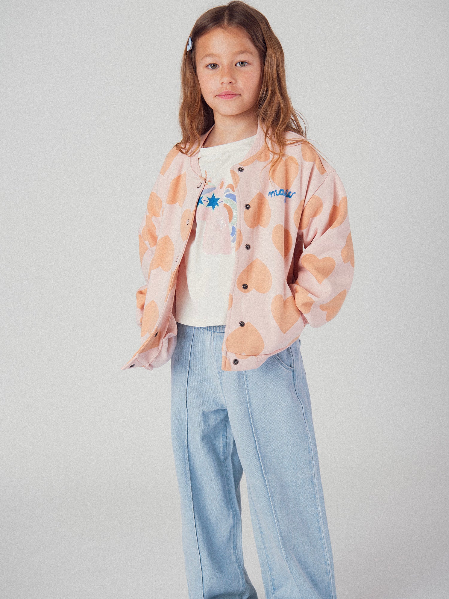 Gilet rose à imprimé coeur pour fille