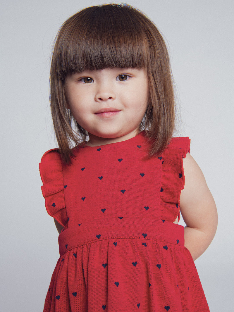 Robe rouge en maille imprimée cœurs pour bébé fille