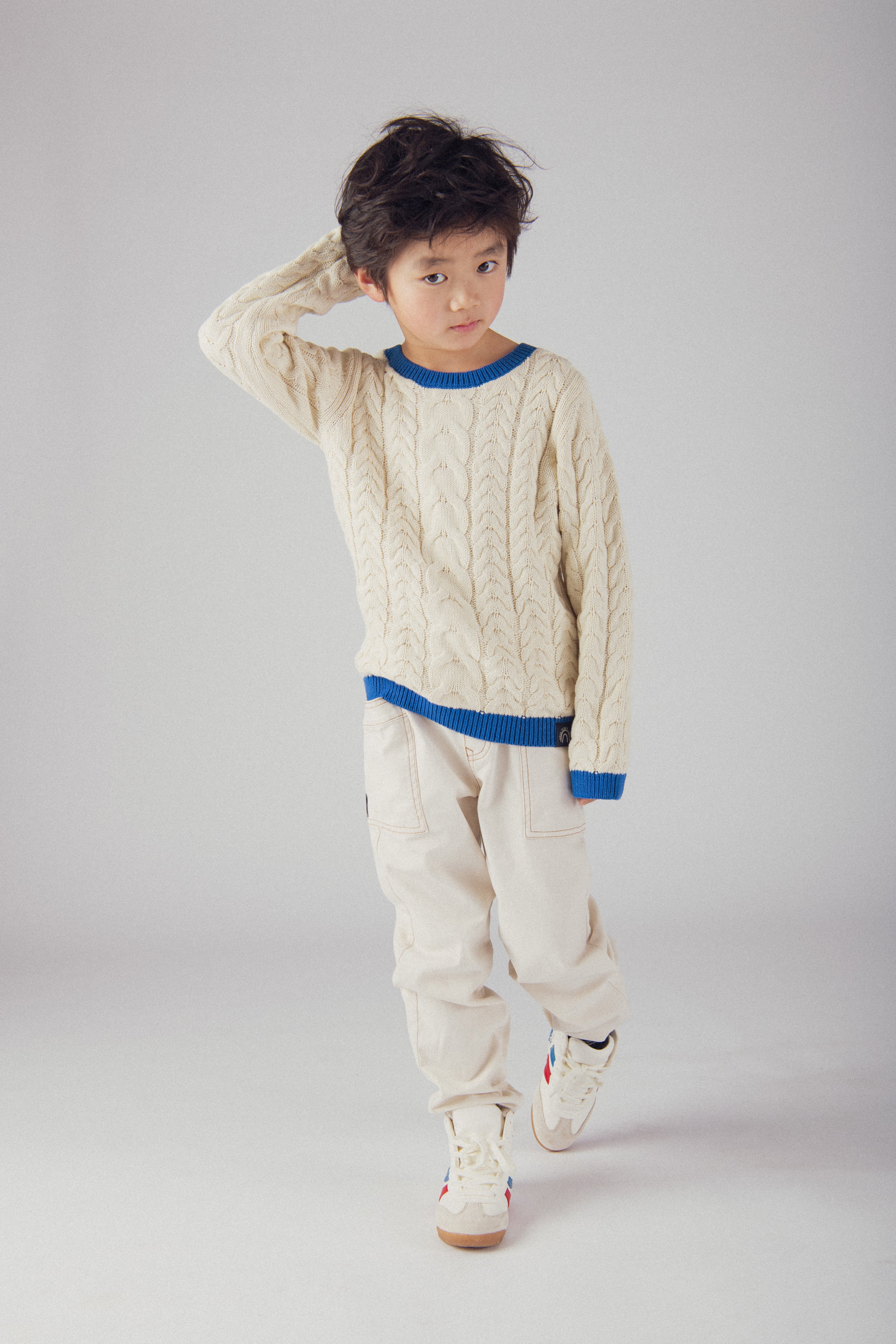 Pull beige a détails bleu pour garçon