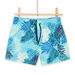 Short de bain bleu à imprimé feuilles